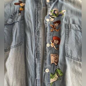 TORRID size 3 Toy Story denim button up.